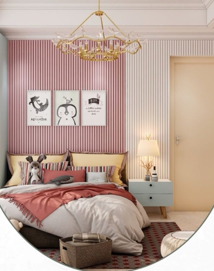 A child's bedroom with pink and white slatted walls, a brass chandelier and framed animal prints